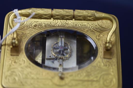 A late 19th century French ormolu hour repeating giant carriage clock, with alarm, height 7in.